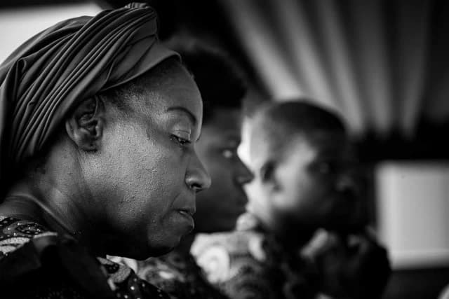 Reflective moments: A Trustee is captured in a pensive moment during the memorial tribute presentations.