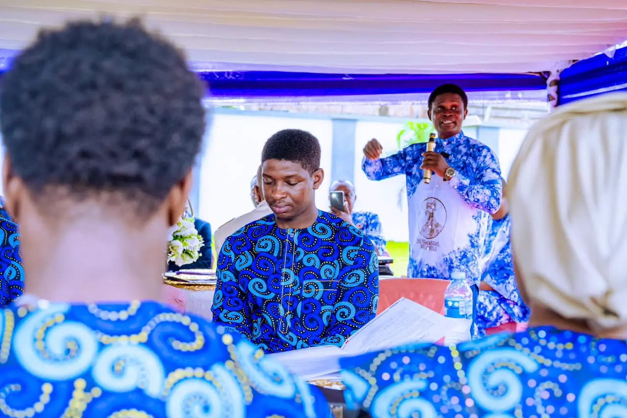 Dignitary address: A community leader delivers a speech to guests during the ceremony proceedings.